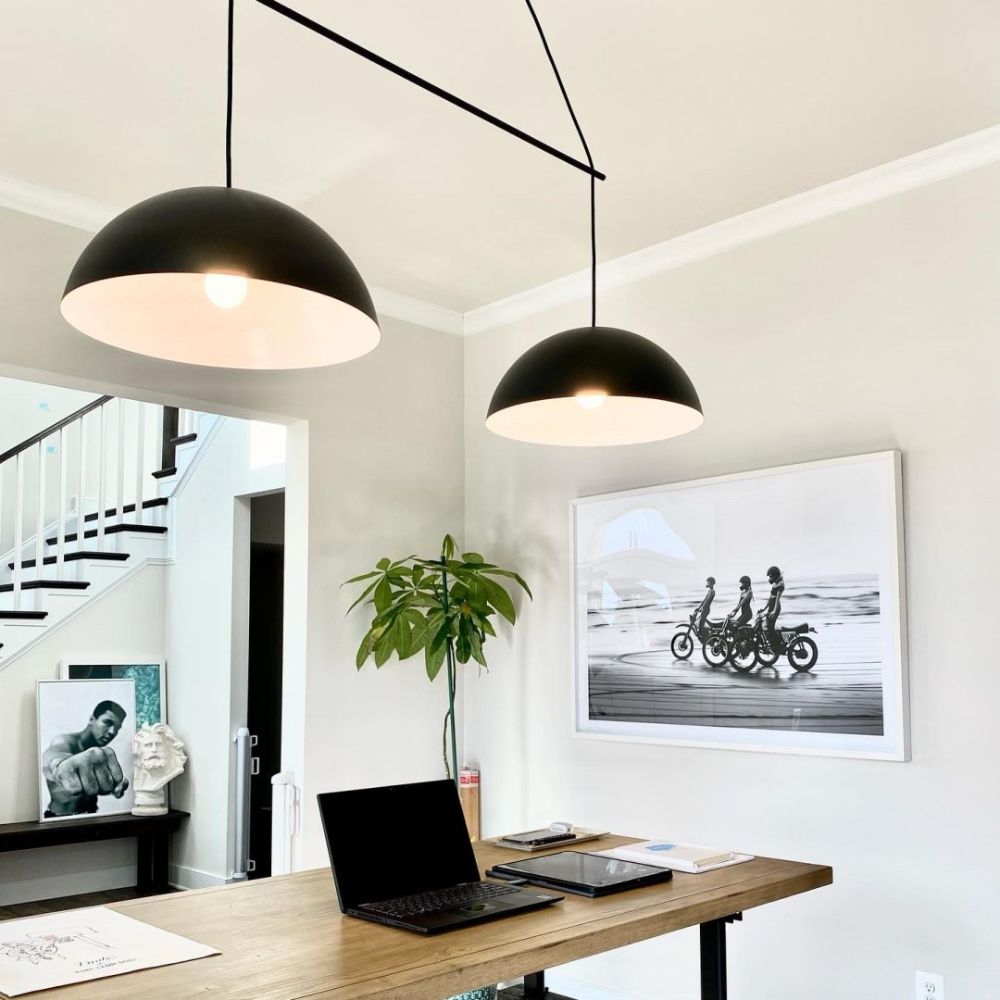 Modern pendant light fixture with brass and glass components